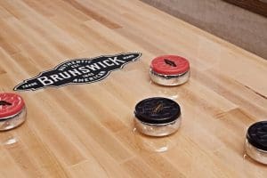 merrimackshuffleboard pucks logo